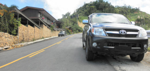 car parked on hill stuck in park